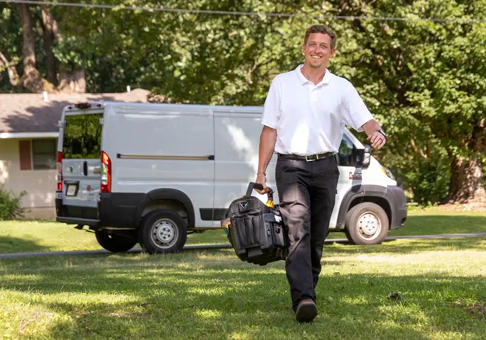 a man standing in front of a truck